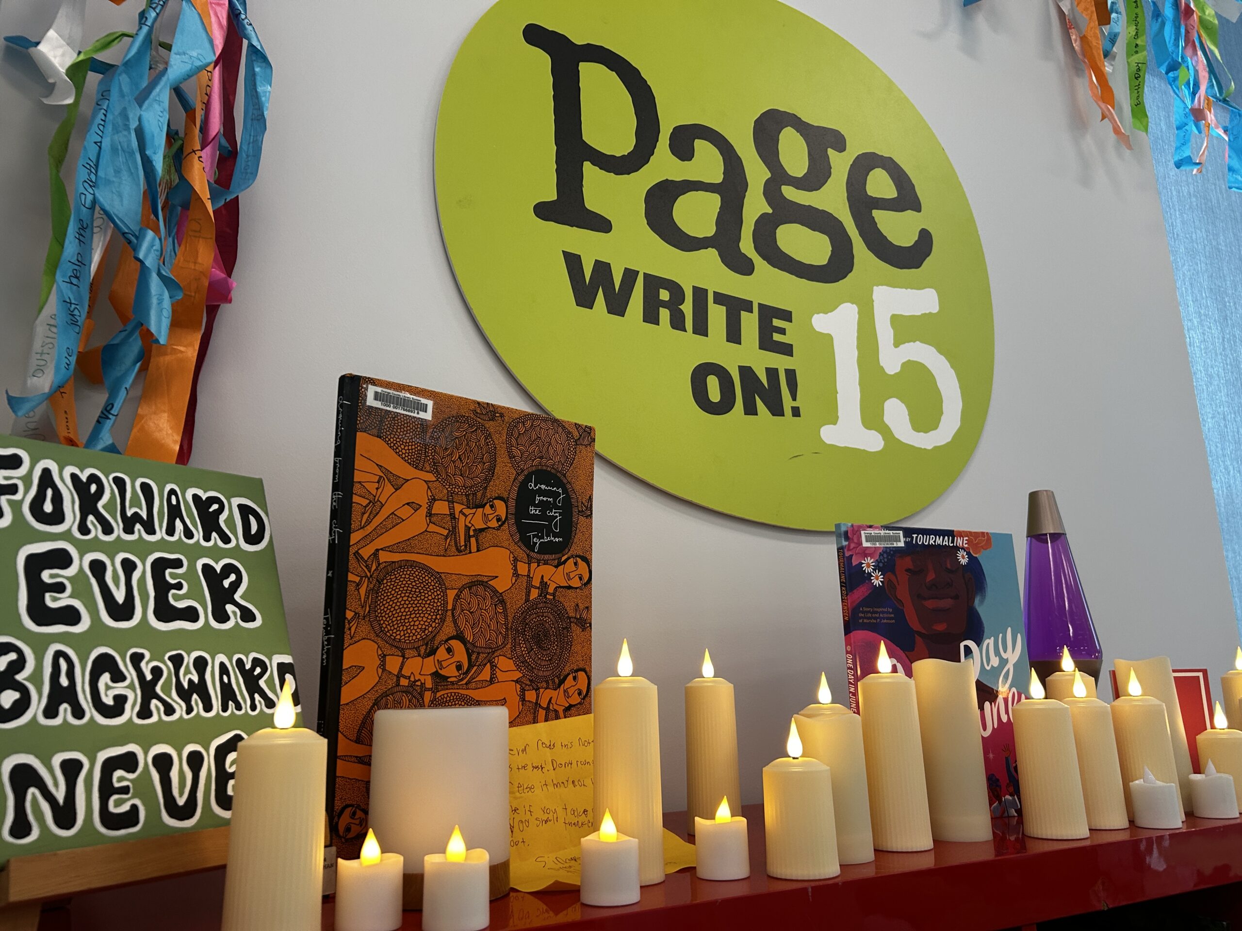 Page 15 wall display with art and candles