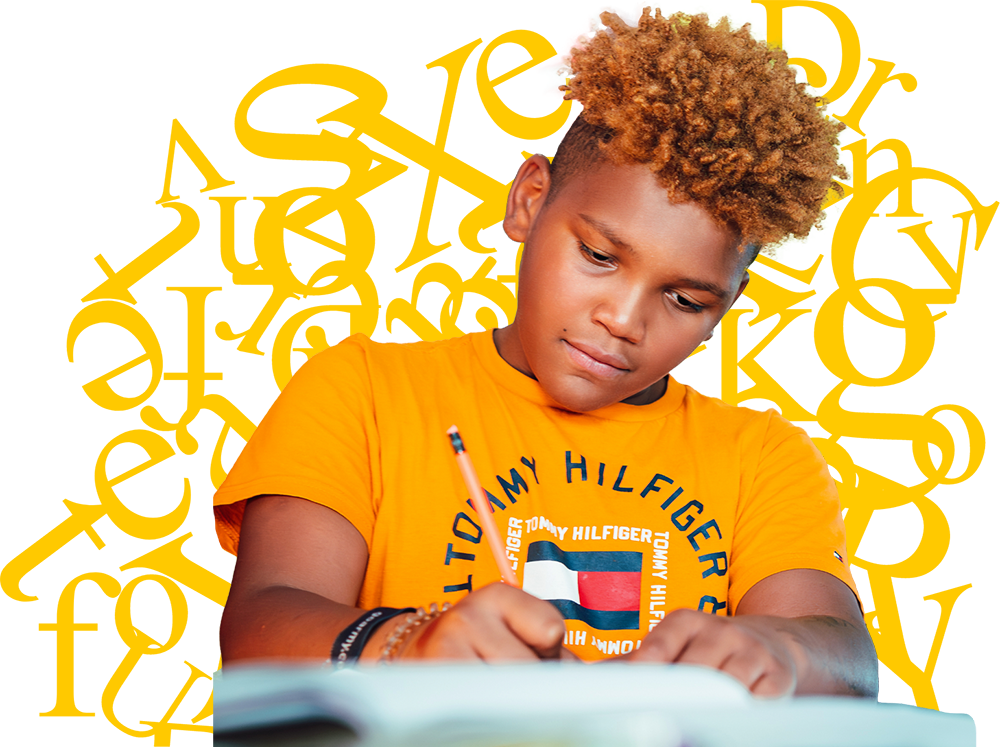 Young student writing in notebook